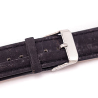 close up of watch strap silver buckle