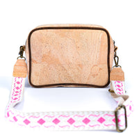 cork purse with pink shoulder strap