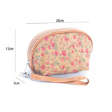 dimensions of a cork clutch bag with floral design and strap